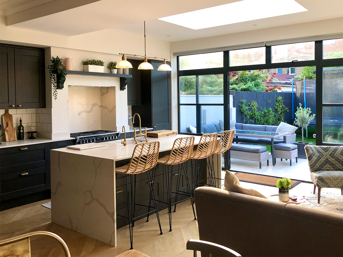 Interior wide shot of Reside Living kitchen, featuring contemporary Toby barstools 